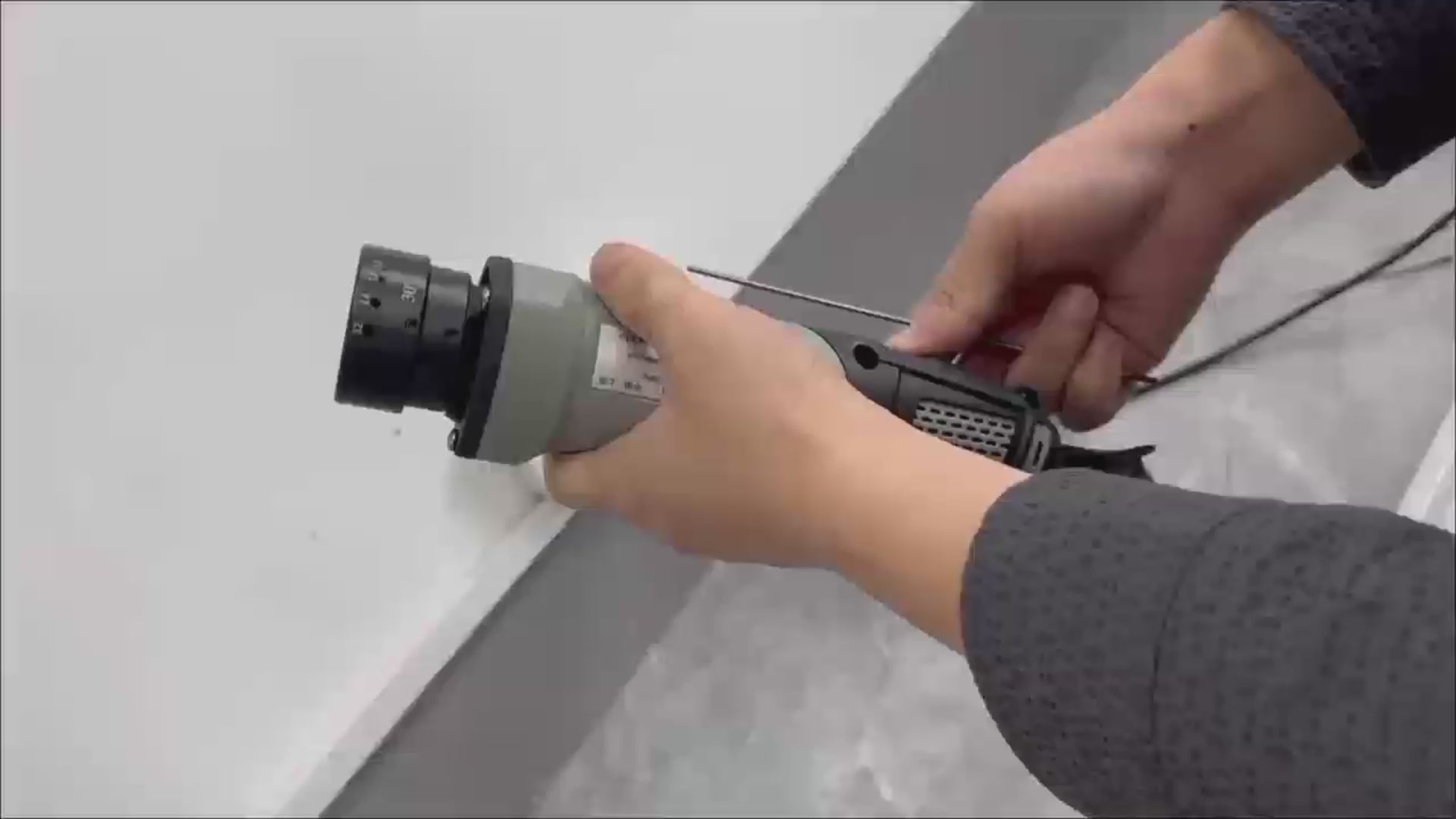 Sharpening tungsten electrodes with precise longitudinal grinding to enhance orbital TIG welding stability.